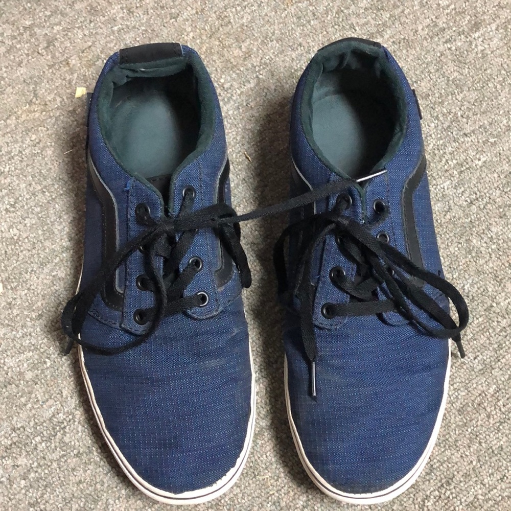 Dark blue and black canvas vans